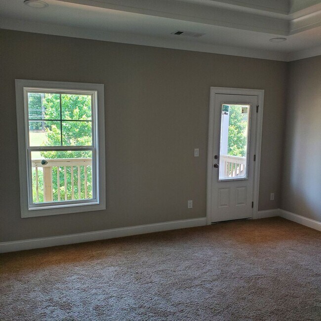 Building Photo - COMING SOON! Stunning New Home in Prime Mi...