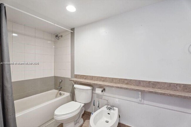 Building Photo - 5600 Collins Ave
