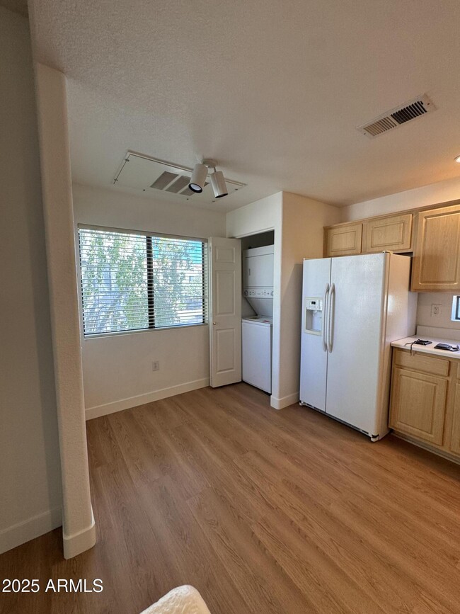 Building Photo - 9555 E Raintree Dr