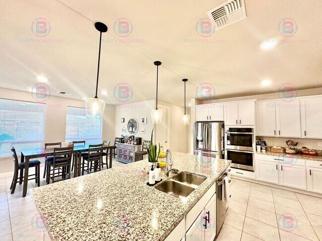 Building Photo - Welcome to your dream home, where modern elegance meets unparalleled convenience!