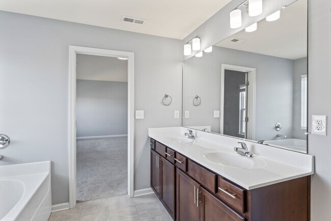 Building Photo - Stunning 4-Bedroom Home with Serene Pond Views