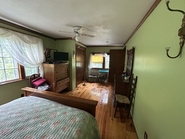 Building Photo - Charming 3BR Waterfront Retreat with Sunroom, Brick Accent & Scenic Lake Views