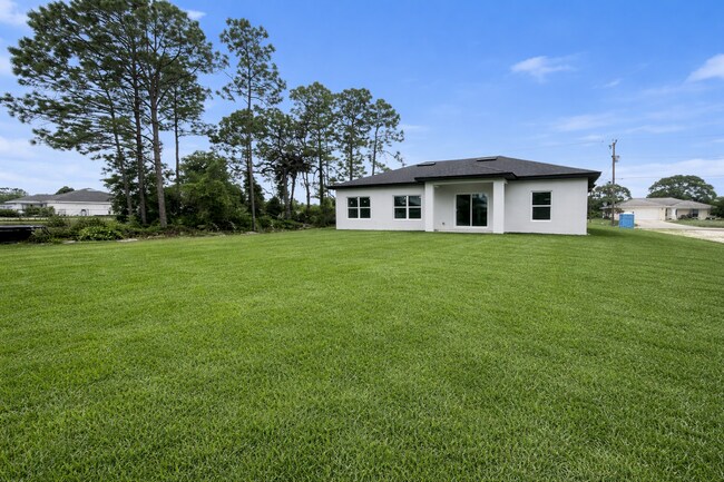 Building Photo - JUST BUILT! Spacious 4/2/2 Home -Perfect for Your Family in SW Lehigh Acres