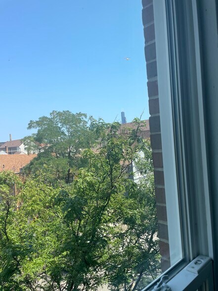 Peek of downtown from building - 1527 W 18th St