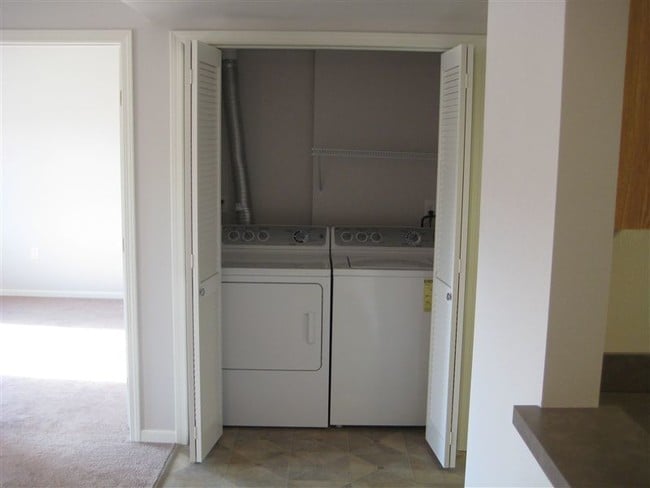 Washer and Dryer in each apartment - The Orchards at Wildewood Apartments