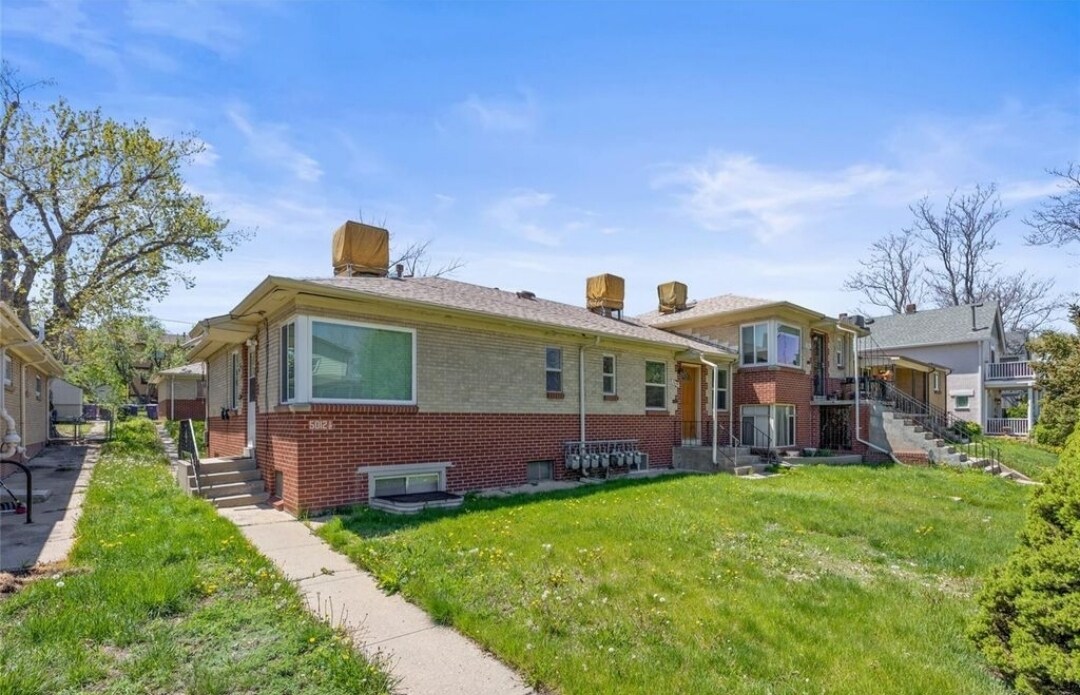 Six units in this complex surrounded by homes. Live in a condo with a single family community - 5014 W 36th Ave