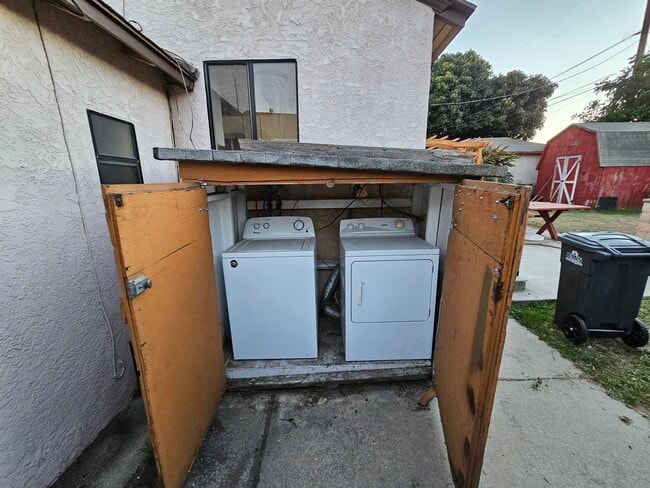 Washer and Dryer in backyard - 22909 Broadwell Ave