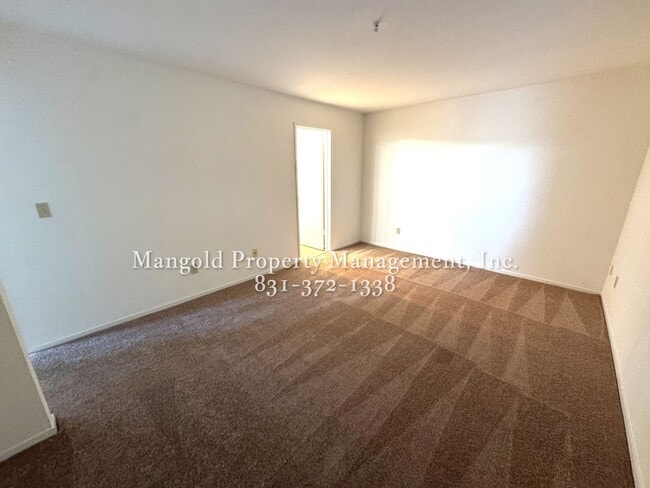 Building Photo - Spacious 2-Bed, 2-Bath Condo with Fireplac...