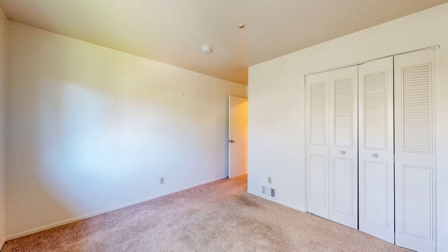 Building Photo - 2 story 2 bedroom 1 bath condo with covered parking, private storage and community pool!