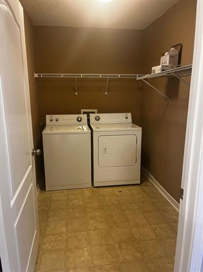 Building Photo - Townhome Living Made Easy: Your 2-Bed, 2-B...