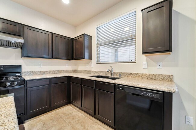 Building Photo - Stylish Two-Story Retreat with Designer Kitchen, Private Backyard & Flexible Living Space!