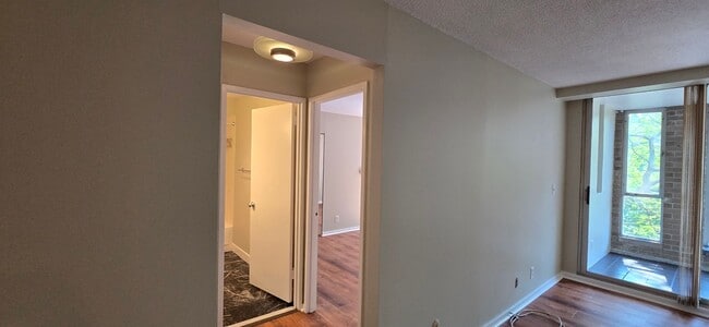 Building Photo - Short walk to Longwood! Steps to T! Large 1 bedroom w/enclosed porch! Garage parking incl.