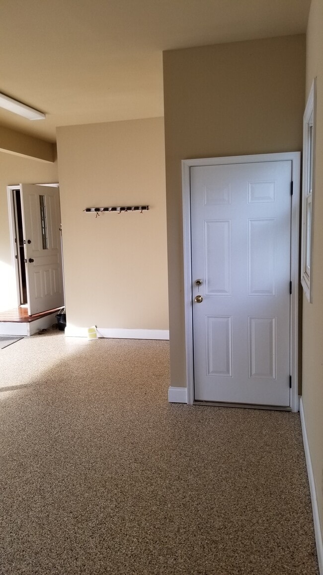 garage with storage above - 379 Sacred Heart Way