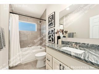 Building Photo - 875 E 78th Ave