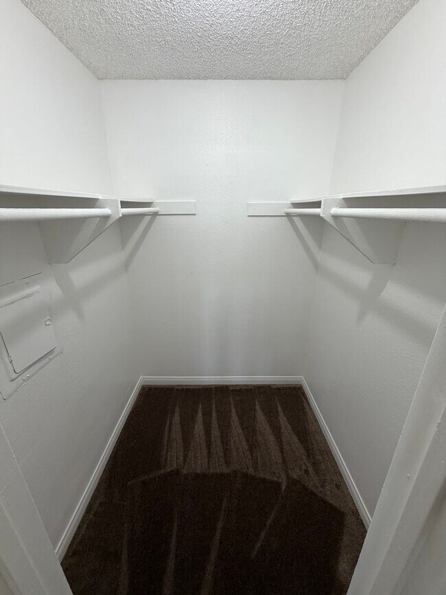 Building Photo - 2BR/1BA Lakeside ground floor condo with 1 car detached garage, 1 uncovered parking space & commu...