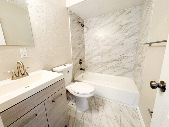 Building Photo - Updated 3 bedroom 2 bath! Lots of yard space for parking