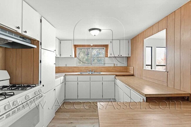 Building Photo - Affordable 2 Bedroom with Yard Space & Functional Layout