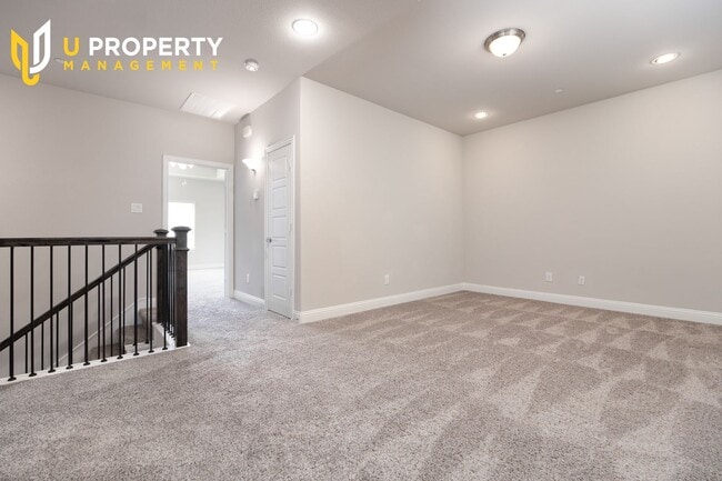 Building Photo - Luxury Townhome- wood flooring. Great location