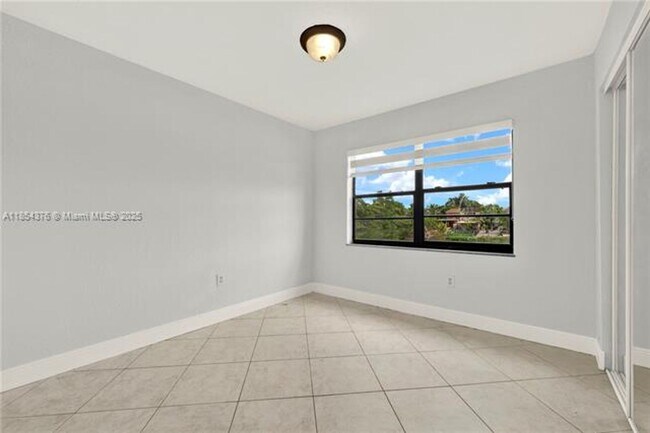 Building Photo - 1335 W 68th St