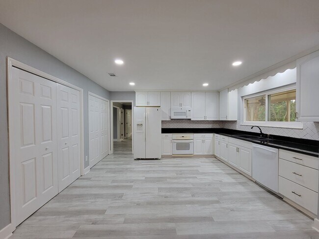 Building Photo - 4 bedroom house for rent in NE Tallahassee for $3250 with a 2 car garage, wood floors