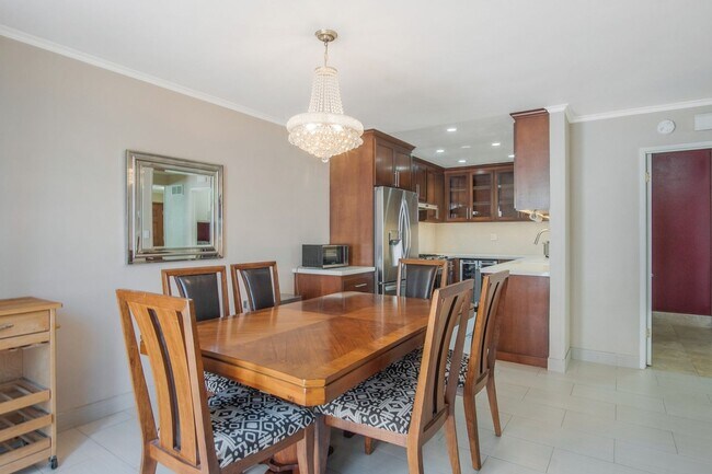 Building Photo - Renovated three-bedroom, three-bath 2-stor...