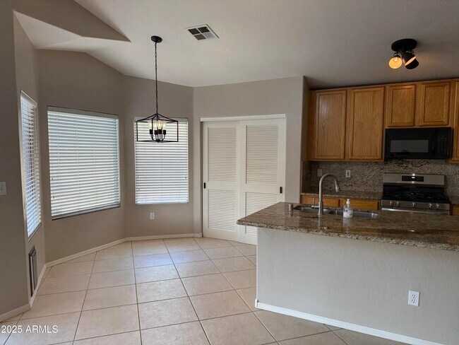 Building Photo - 7458 W Firebird Dr