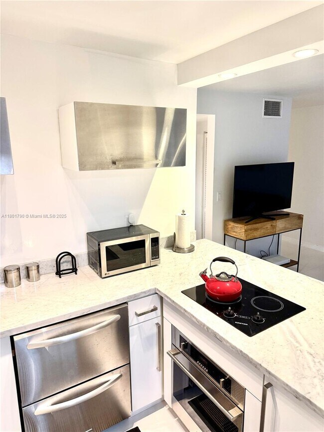 Building Photo - 240 Collins Ave