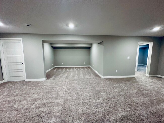 Building Photo - {13305} Less Than 2 Year Old 1.5 Story in ...