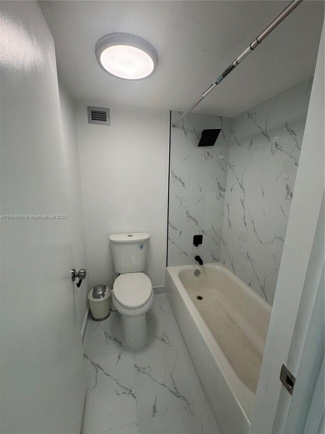 Building Photo - 6039 Collins Ave