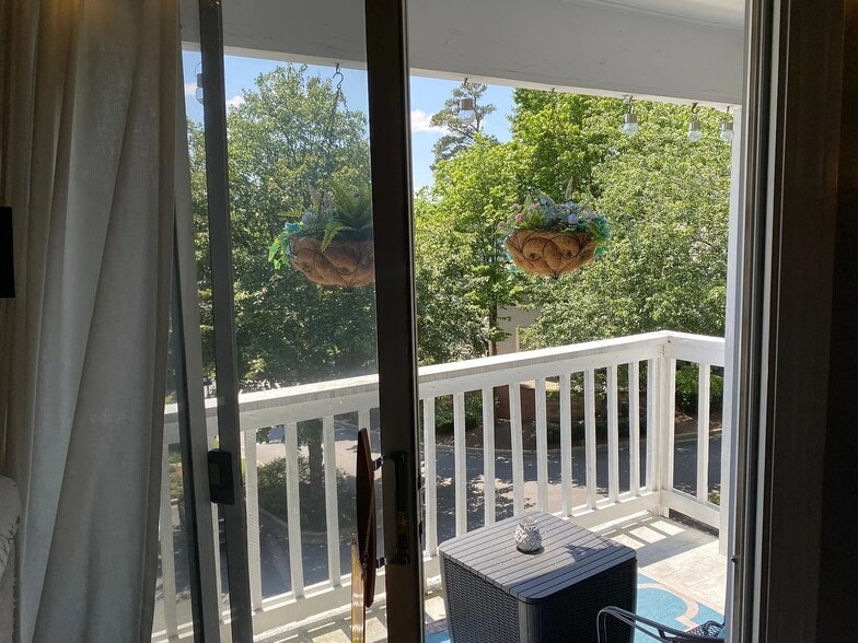 Sliding glass door leads onto third floor balcony - 1483 Keys Crossing Dr NE