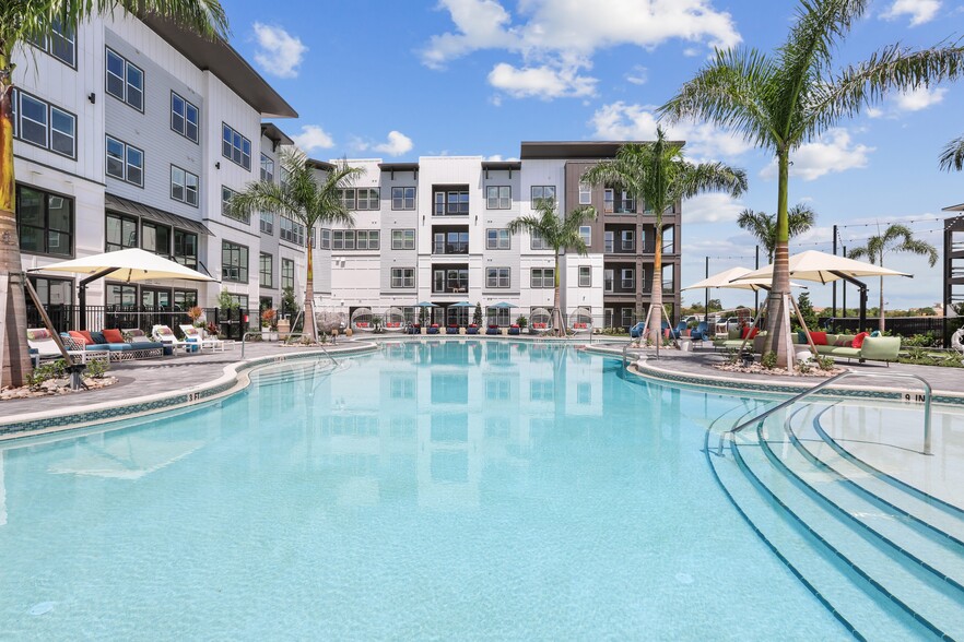 Resort-Style Pool with Sun Shelf - Sopra Luxury Living