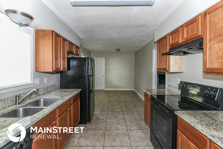 Building Photo - 6350 Limewood Ave