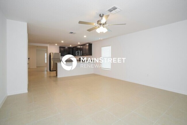 Building Photo - 4 Bedroom Pet-Friendly Home in Mascotte, FL with Main Street Renewal