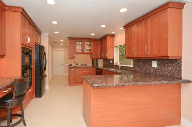 Granite countertops in kitchen - 4355 NW 25th Way