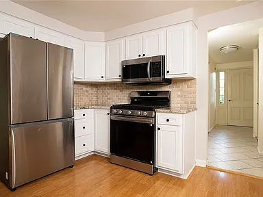 Building Photo - Charming 4-Bed Retreat with Finished Basem...