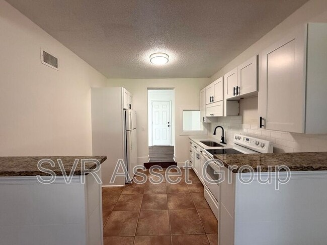 Building Photo - 6204 Terry Parker Dr N