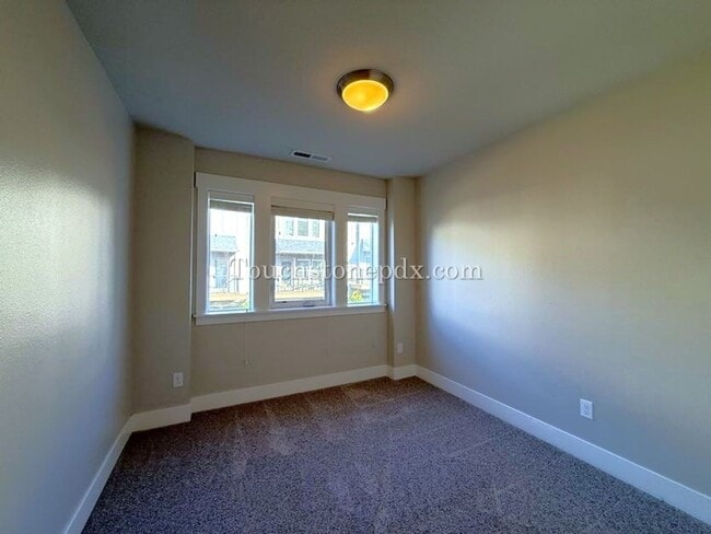 Building Photo - Modern Open Concept 3 Bedroom Home with Balcony and Attached Garage