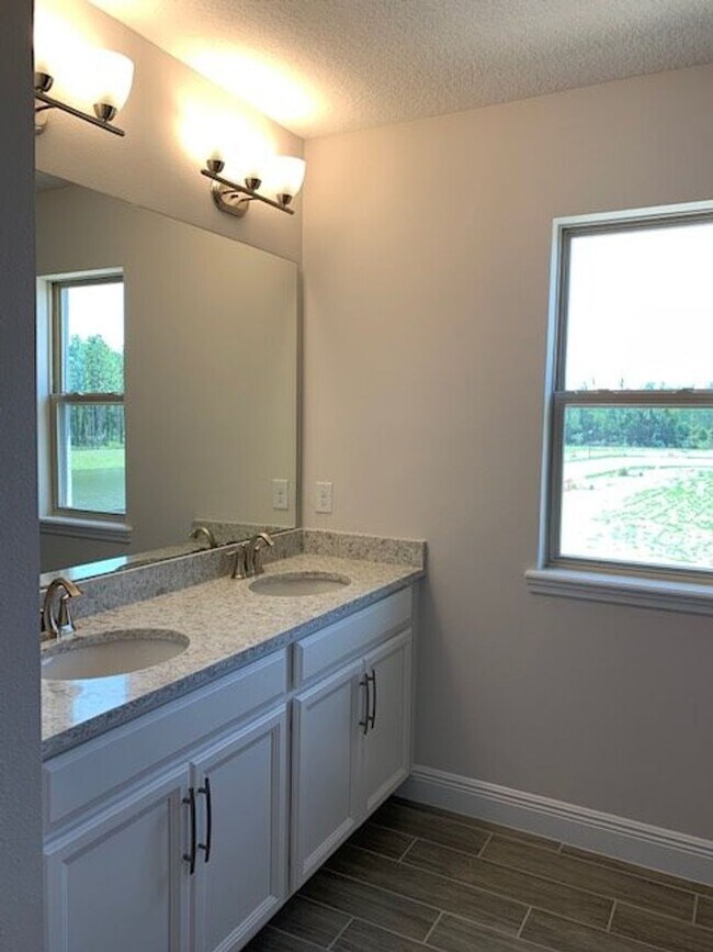 Building Photo - SPECTACULAR MODERN HOME!!Relaxing water views from the back of this beautiful home- MOVE IN Septe...
