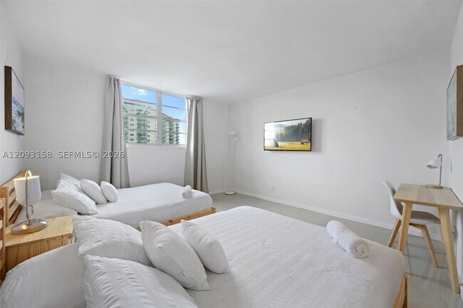 Building Photo - 19370 Collins Ave
