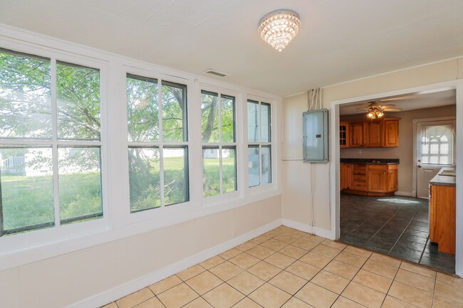 Building Photo - Charming 4-Bedroom Home with Hardwood Floo...
