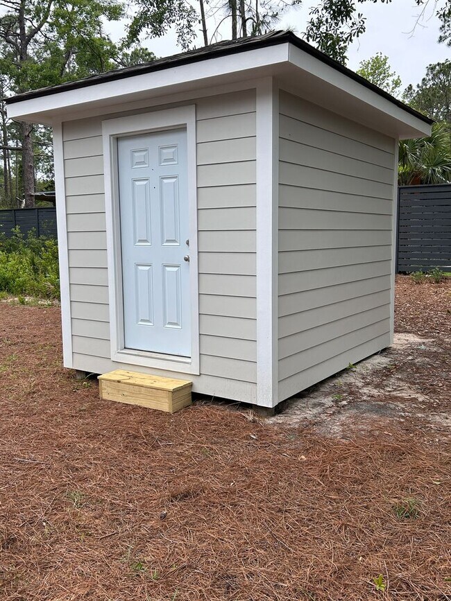 Building Photo - New build! 3/2 with backyard storage shed