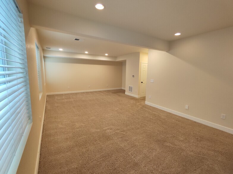 Finished Rec Room in Basement - 17778 E 44th Ave