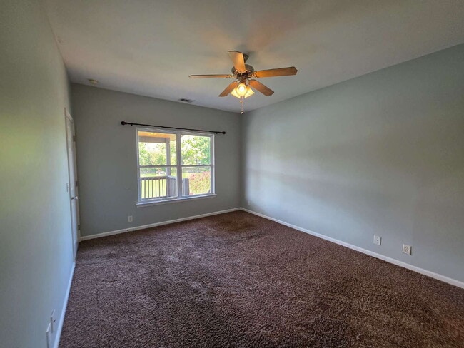 Building Photo - Lakefront 3BR/3BA with Covered Deck, Garage & Community Pool