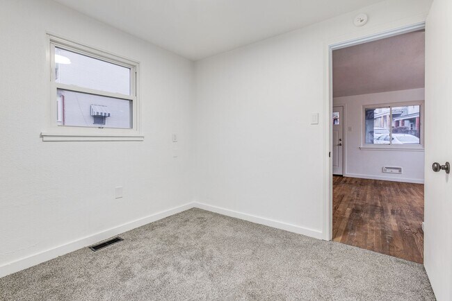 Building Photo - AVAILABLE JUNE 2026! - 2 Bedroom Suburban Vibes in the HEART of the City!!