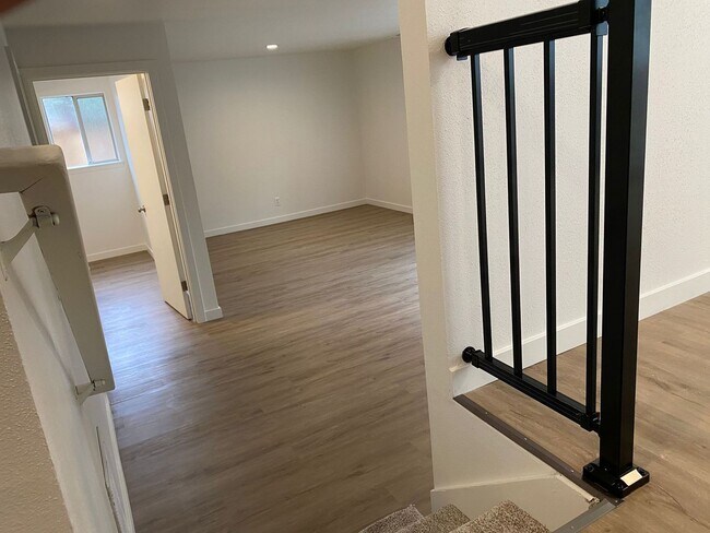Building Photo - Stylishly Renovated Home with Private Back...