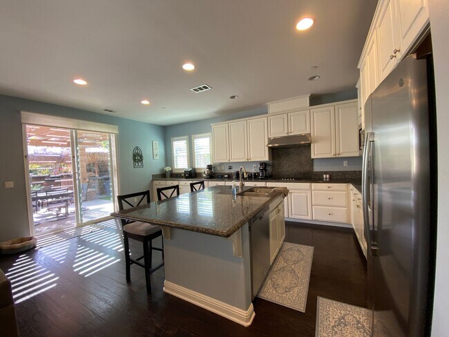 Building Photo - Spacious 5-Bedroom Luxury Home with Entertainer’s Backyard Oasis