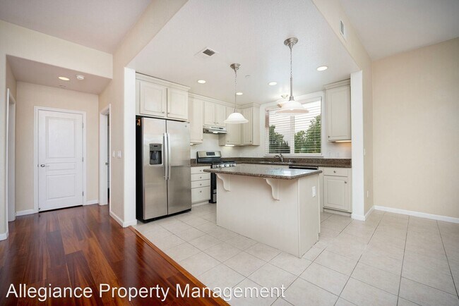 Building Photo - 3 br, 3 bath House - 7910 Walerga Rd Unit 706