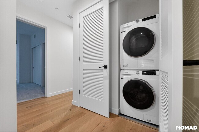 Building Photo - Act Fast: Luxury SoMa Corner Unit w/ EV Parking & Views