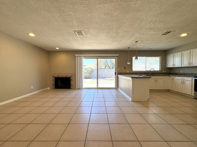 Building Photo - CORNER LOT 3 BEDROOM PLUS DEN WITH FIREPLACE AND LARGE YARD