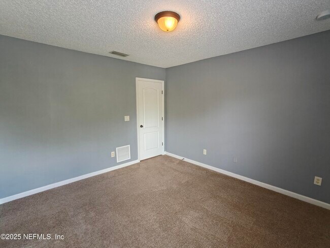 Building Photo - 7764 Playschool Ln